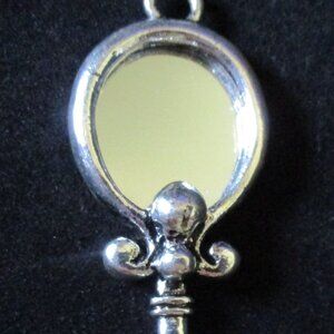 Vintage Unbranded Silver Tone Mirror Key Charm With Heart Cutout  2.75" x 1"